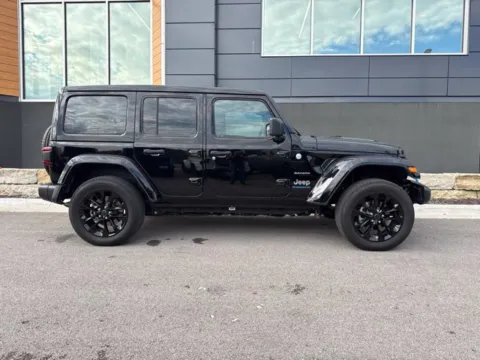 Photos of 2024 Jeep Wrangler Sahara 4xe for sale in Platte City, MO at Airport Chrysler Dodge Jeep Ram