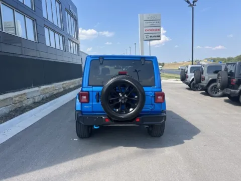 More photos of 2022 Jeep Wrangler Unlimited Sahara 4xe at Airport Chrysler Dodge Jeep Ram, MO