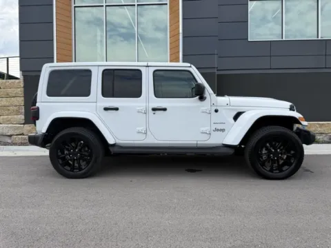 Photos of 2023 Jeep Wrangler Sahara 4xe for sale in Platte City, MO at Airport Chrysler Dodge Jeep Ram