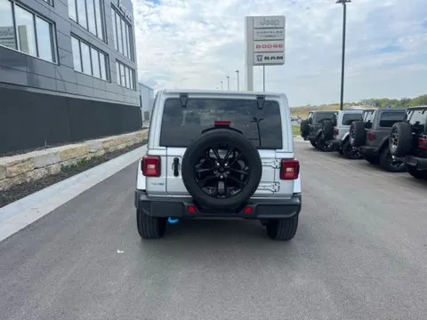 More photos of 2022 Jeep Wrangler Unlimited Sahara 4xe at Airport Chrysler Dodge Jeep Ram, MO