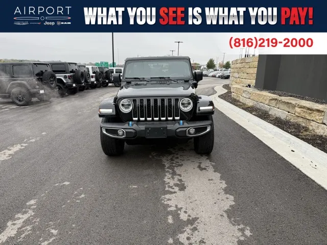 Used 2022 Jeep Wrangler Unlimited Sahara 4XE with VIN 1C4JJXP66NW270911 for sale in Kansas City