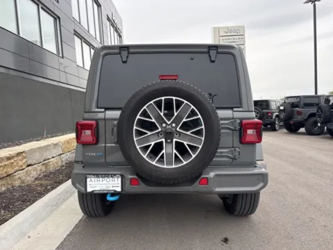 More photos of 2023 Jeep Wrangler Sahara 4xe at Airport Chrysler Dodge Jeep Ram, MO