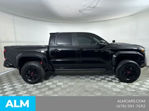 More photos of 2024 Toyota Tacoma Hybrid TRD Pro at ALM Mazda South, GA