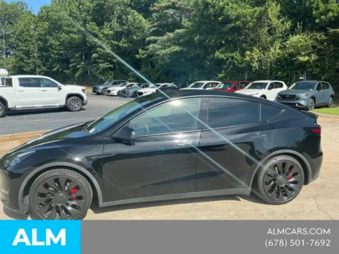 Photos of 2022 Tesla Model Y Performance for sale in Morrow, GA at ALM Mazda South