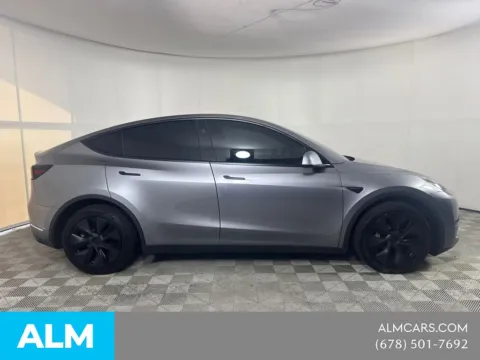 More photos of 2025 Tesla Model Y Long Range at ALM Mazda South, GA