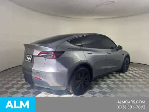 More photos of 2025 Tesla Model Y Long Range at ALM Mazda South, GA