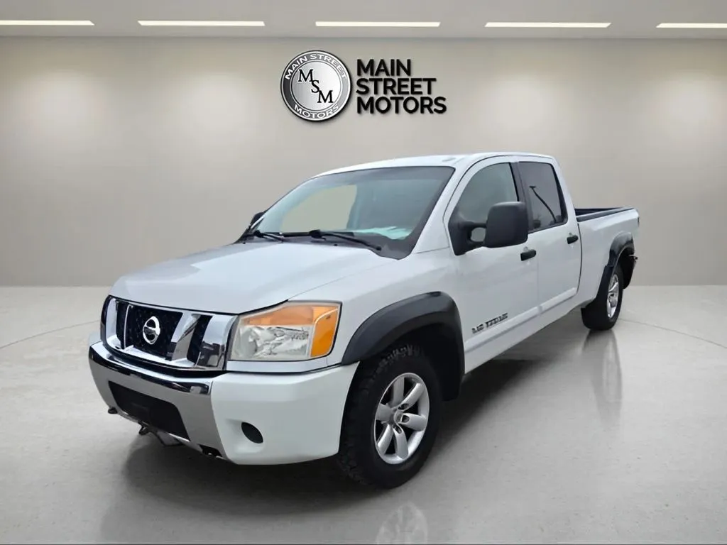 White 2008 Nissan Titan Crew Cab LE Pickup 4D 7 ft for sale in Portage, IN