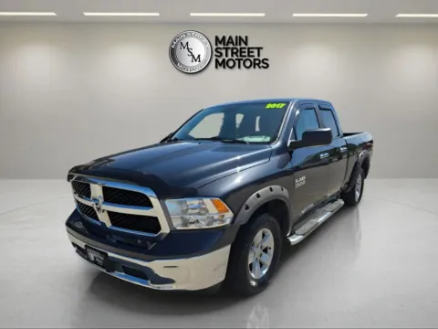 Gray 2017 Ram 1500 Quad Cab SLT Pickup 4D 6 1/3 ft for sale in Portage, IN
