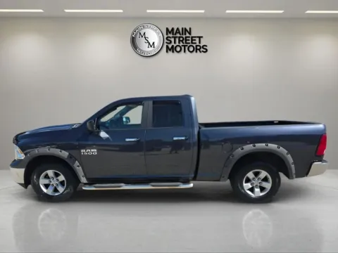 Photos of 2017 Ram 1500 Quad Cab SLT Pickup 4D 6 1/3 ft for sale in Portage, IN at Main Street Motors