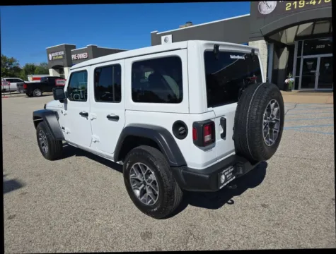 Photos of 2024 Jeep Wrangler 4 Door Sport S Sport Utility 4D for sale in Portage, IN at Main Street Motors