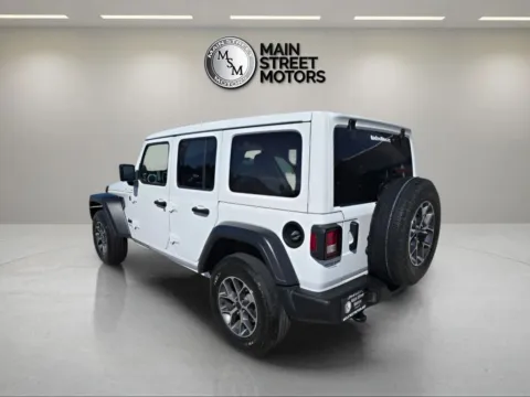 Another view of 2024 Jeep Wrangler 4 Door Sport S Sport Utility 4D for sale in Portage, IN at Main Street Motors