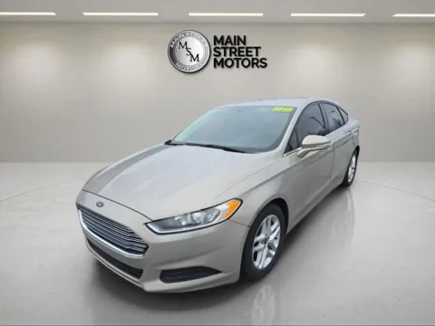 Gold 2015 Ford Fusion SE Sedan 4D for sale in Portage, IN