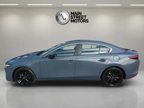 Photos of 2024 MAZDA MAZDA3 2.5 S Carbon Edition Sedan 4D for sale in Portage, IN at Main Street Motors