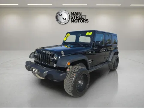 Black 2014 Jeep Wrangler Unlimited Sport SUV 4D for sale in Portage, IN