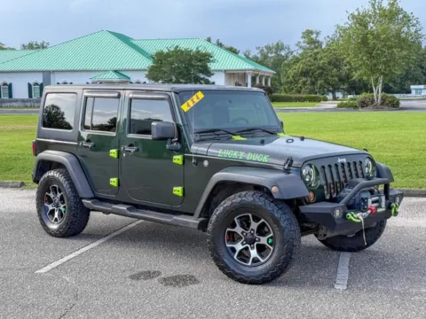 Green 2011 Jeep Wrangler Unlimited Sport for sale in Foley, AL