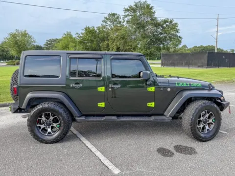 Another view of 2011 Jeep Wrangler Unlimited Sport for sale in Foley, AL at Coastal Auto Group