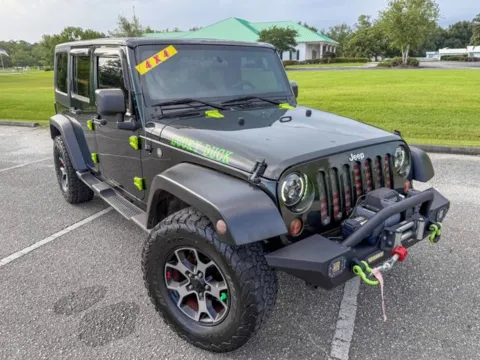 Photos of 2011 Jeep Wrangler Unlimited Sport for sale in Foley, AL at Coastal Auto Group