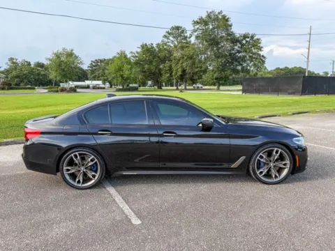 Another view of 2018 BMW 5 Series M550i xDrive for sale in Foley, AL at Coastal Auto Group