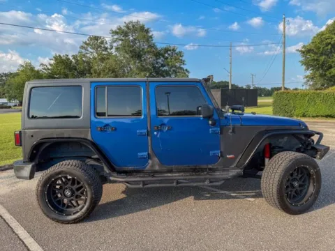 Another view of 2010 Jeep Wrangler Unlimited Sport for sale in Foley, AL at Coastal Auto Group