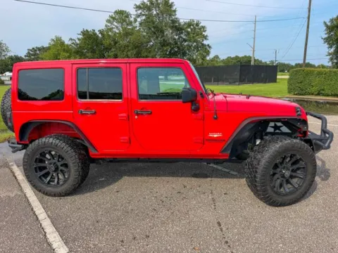 Photos of 2015 Jeep Wrangler Unlimited Sahara for sale in Foley, AL at Coastal Auto Group