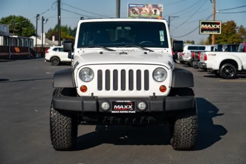 Another view of 2012 Jeep Wrangler Unlimited Sport SUV 4D for sale in Puyallup, WA at Maxx Autos Plus Puyallup