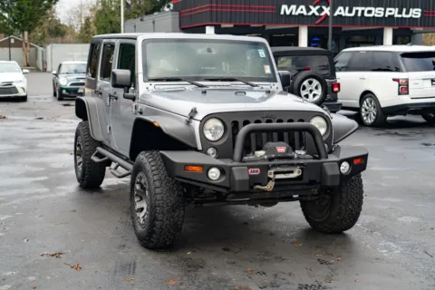 Photos of 2015 Jeep Wrangler Unlimited Sport for sale in Puyallup, WA at Maxx Autos Plus Puyallup