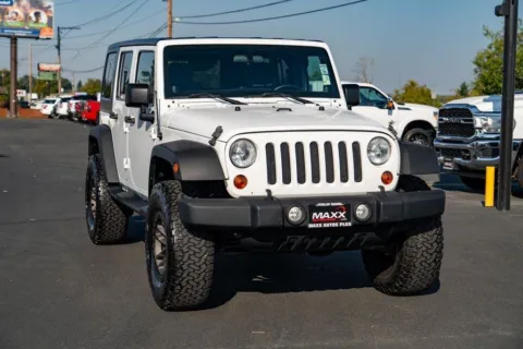Photos of 2012 Jeep Wrangler Unlimited Sport SUV 4D for sale in Puyallup, WA at Maxx Autos Plus Puyallup