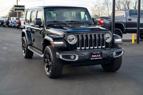 Photos of 2021 Jeep Wrangler 4xe Unlimited Sahara for sale in Puyallup, WA at Maxx Autos Plus Puyallup