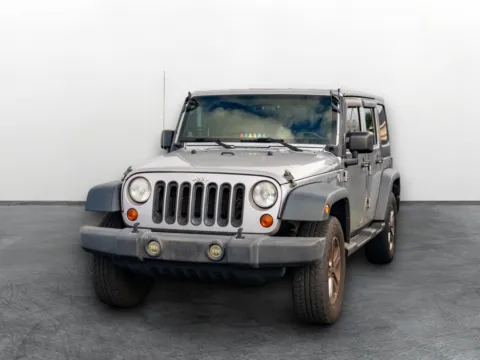 Another view of 2013 Jeep Wrangler Unlimited Sport for sale in Puyallup, WA at Maxx Autos Plus Puyallup