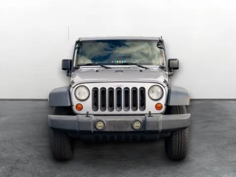 Photos of 2013 Jeep Wrangler Unlimited Sport for sale in Puyallup, WA at Maxx Autos Plus Puyallup