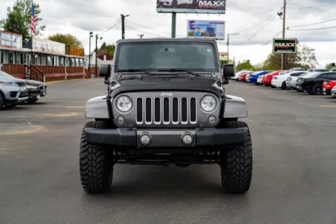 Another view of 2018 Jeep Wrangler JK Unlimited Sahara for sale in Puyallup, WA at Maxx Autos Plus Puyallup