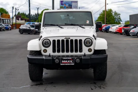 Another view of 2015 Jeep Wrangler Unlimited Altitude for sale in Puyallup, WA at Maxx Autos Plus Puyallup