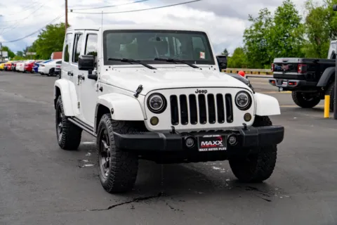Photos of 2015 Jeep Wrangler Unlimited Altitude for sale in Puyallup, WA at Maxx Autos Plus Puyallup