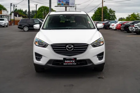 Another view of 2016 Mazda CX-5 Touring for sale in Puyallup, WA at Maxx Autos Plus Puyallup