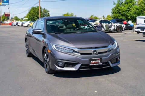 Photos of 2017 Honda Civic Touring for sale in Puyallup, WA at Maxx Autos Plus Puyallup