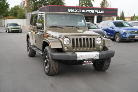 Photos of 2015 Jeep Wrangler Unlimited Sahara for sale in Puyallup, WA at Maxx Autos Plus Puyallup