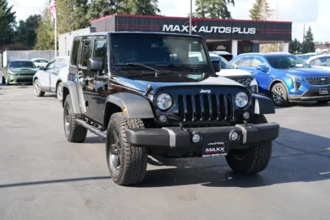 Photos of 2015 Jeep Wrangler Unlimited Sport for sale in Puyallup, WA at Maxx Autos Plus Puyallup