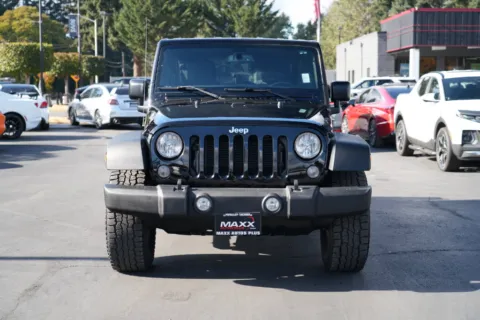 Another view of 2015 Jeep Wrangler Unlimited Sport for sale in Puyallup, WA at Maxx Autos Plus Puyallup