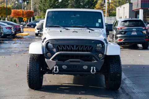 Another view of 2012 Jeep Wrangler Unlimited Sahara for sale in Puyallup, WA at Maxx Autos Plus Puyallup