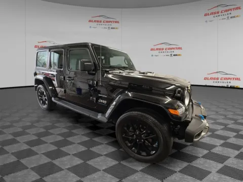 Black 2023 Jeep Wrangler Sahara 4xe for sale in Dunkirk, IN