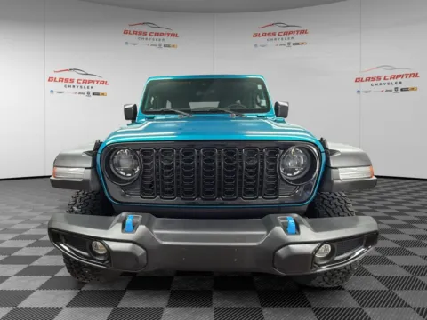 Photos of 2024 Jeep Wrangler Willys 4xe for sale in Dunkirk, IN at Glass Capital Chrysler Dodge Jeep RAM