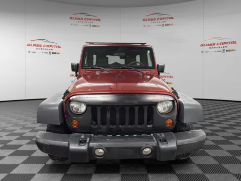 Photos of 2010 Jeep Wrangler Unlimited Sport for sale in Dunkirk, IN at Glass Capital Chrysler Dodge Jeep RAM