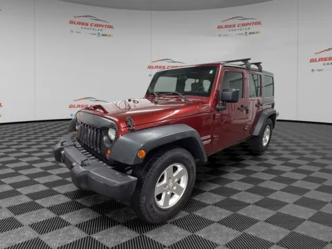 Another view of 2010 Jeep Wrangler Unlimited Sport for sale in Dunkirk, IN at Glass Capital Chrysler Dodge Jeep RAM