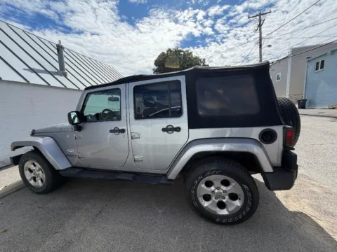 Photos of 2014 Jeep Wrangler Unlimited Sahara for sale in Dunkirk, IN at Glass Capital Chrysler Dodge Jeep RAM