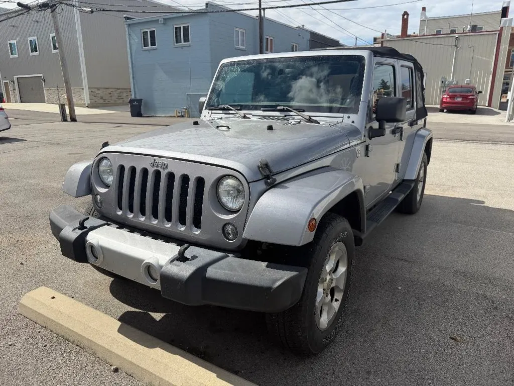 Silver 2014 Jeep Wrangler Unlimited Sahara for sale in Dunkirk, IN