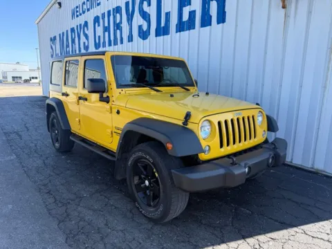 Yellow 2015 Jeep Wrangler Unlimited Sport for sale in Saint Marys, OH