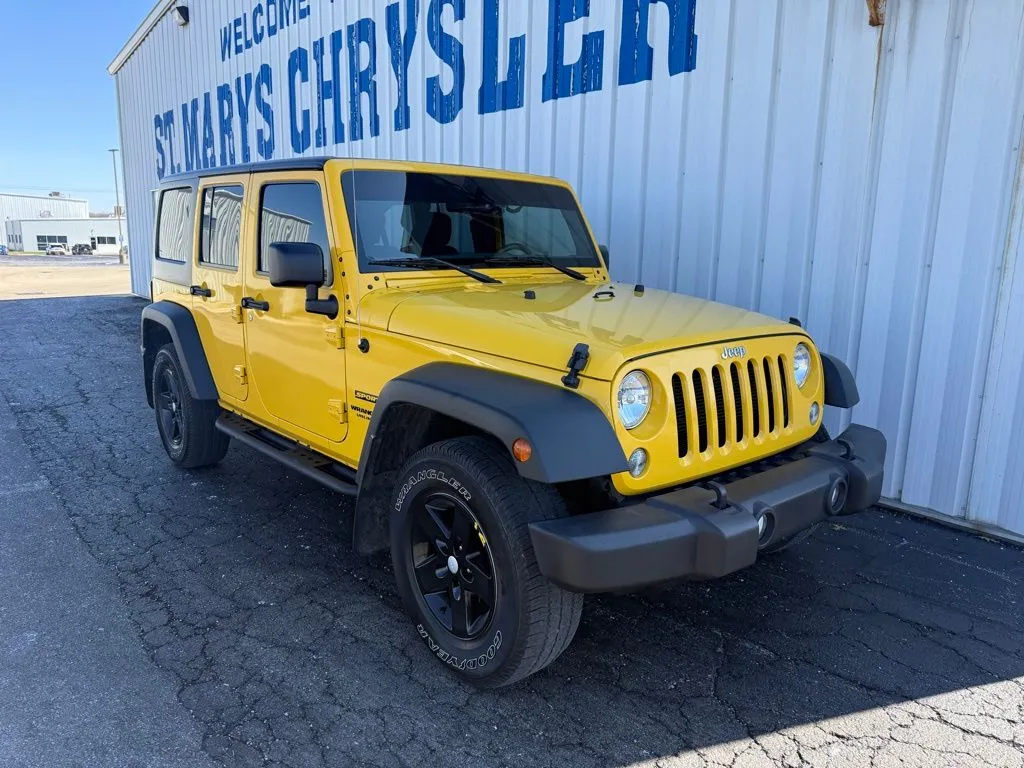 Yellow 2015 Jeep Wrangler Unlimited Sport for sale in Saint Marys, OH