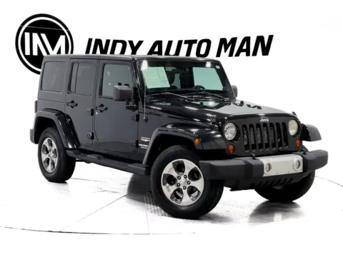 Photos of 2012 Jeep Wrangler Unlimited Sahara for sale in Indianapolis, IN at Indy Auto Man - Indianapolis