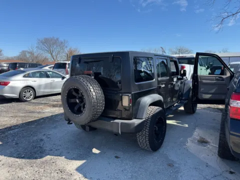 Another view of 2015 Jeep Wrangler Unlimited Sport for sale in Indianapolis, IN at Indy Auto Man - Indianapolis