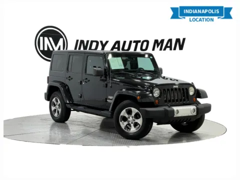 Black 2012 Jeep Wrangler Unlimited Sahara for sale in Indianapolis, IN